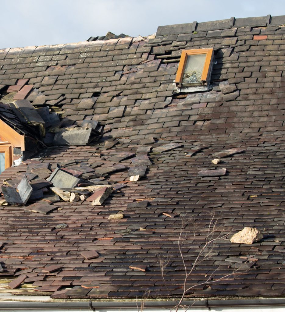 damaged roof hit by storm